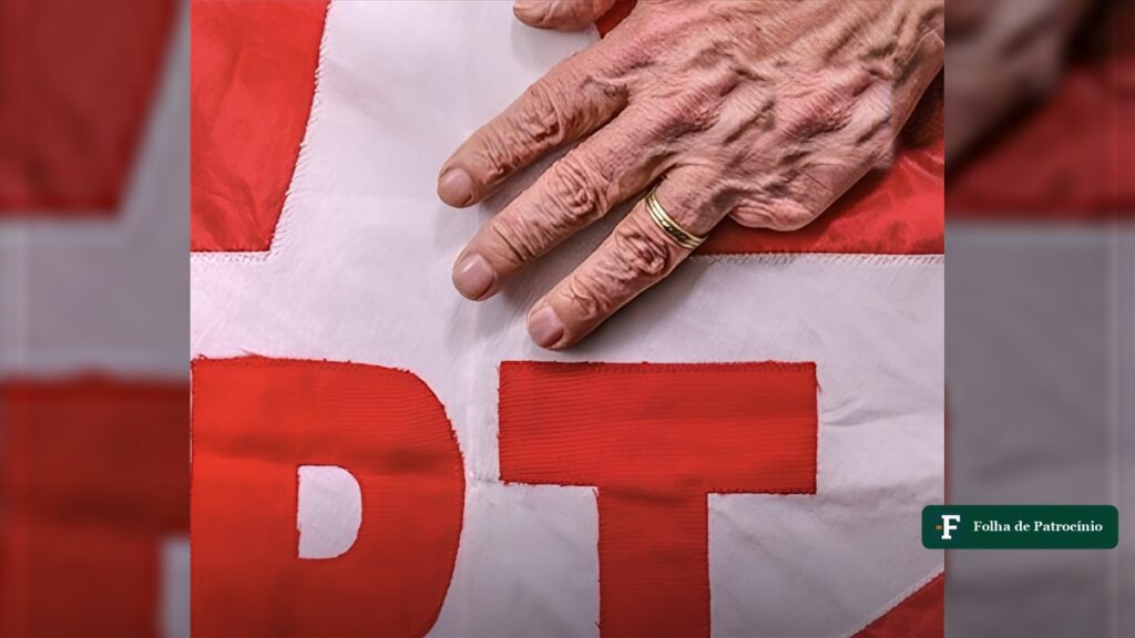 Mão apoiada sobre bandeira do PT, imagem usada na matéria sobre a frase de Maria da Conceição Tavares citada por Lula