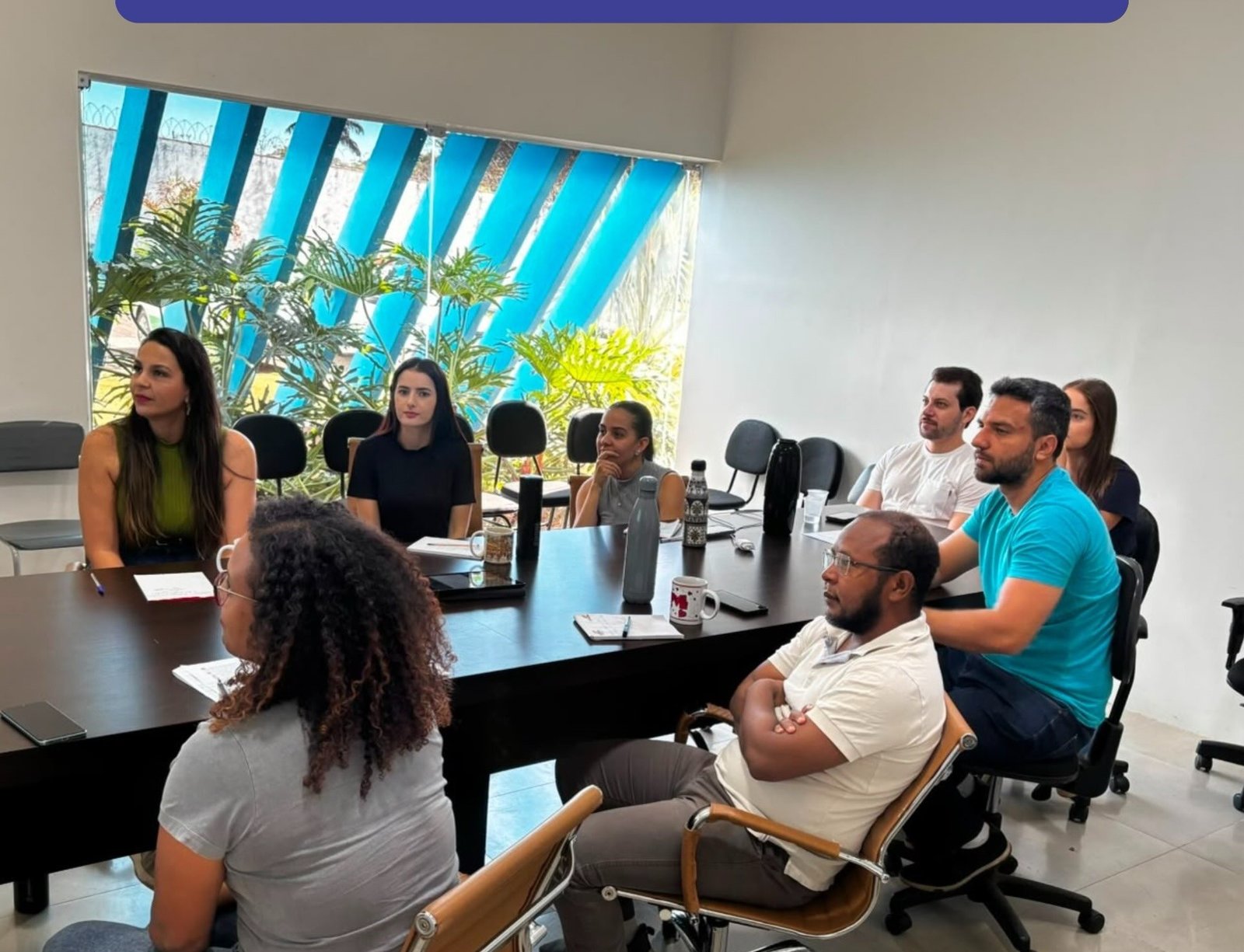 Servidores da capacitação técnica da SEMMA reunidos em sala de reunião da Prefeitura de Patrocínio