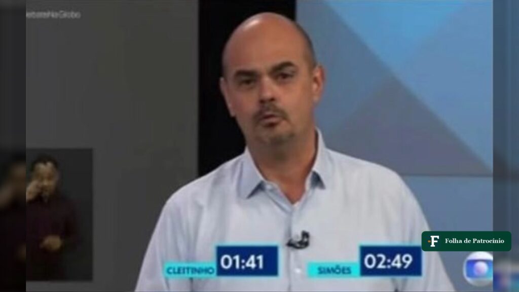 Candidato fala no debate da TV Globo; Pettersen responde Simões sobre a acusação. Imagem: reprodução/TV Globo