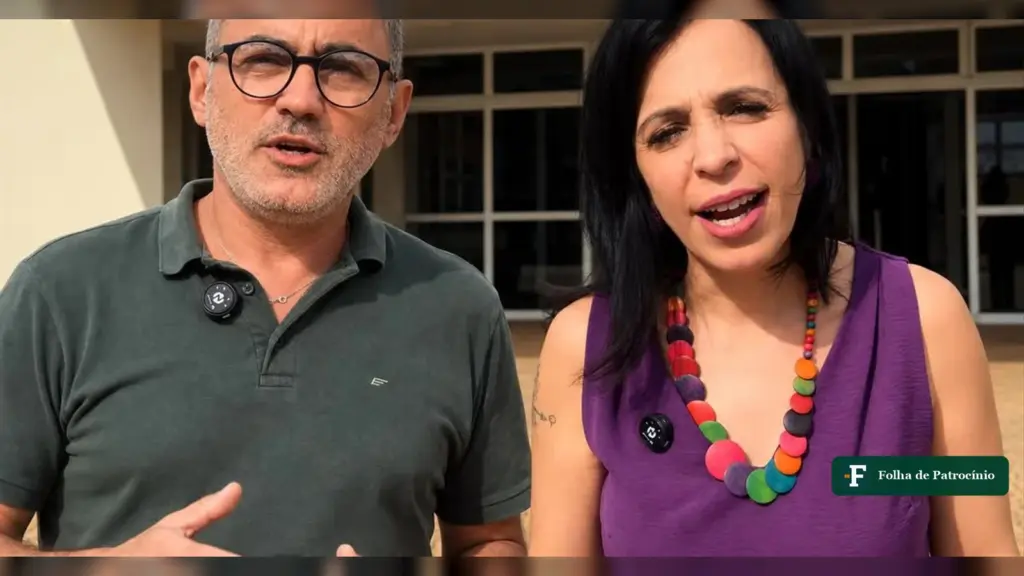 Neilon José, presidente do PT, e a professora Bianca em frente ao Fórum, sobre o boicote a comerciantes em Patrocínio