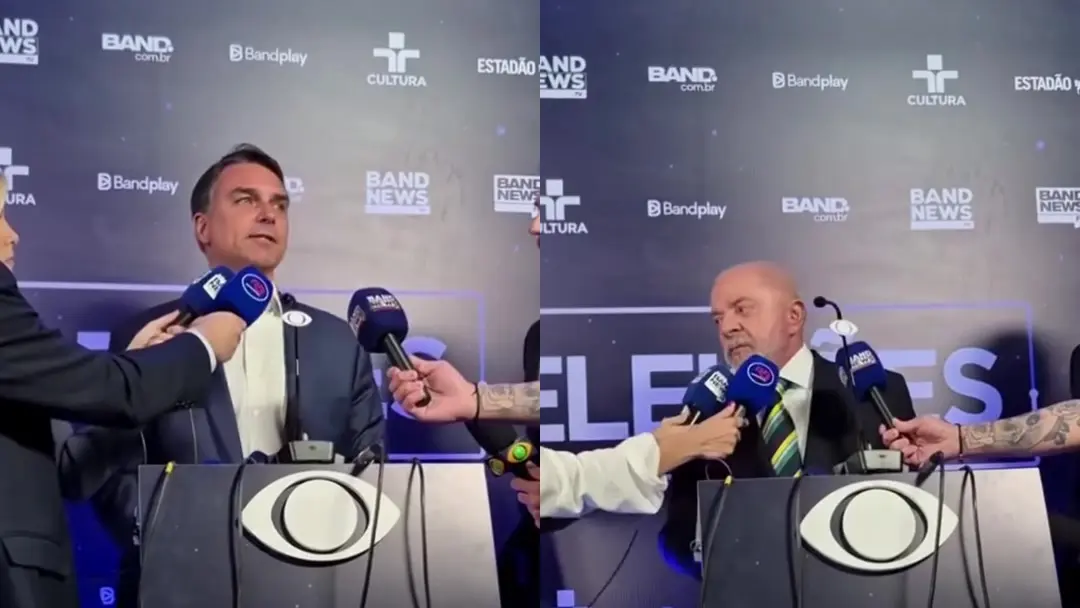 Flávio Bolsonaro e Lula falam com jornalistas atrás do púlpito da Band antes do debate
