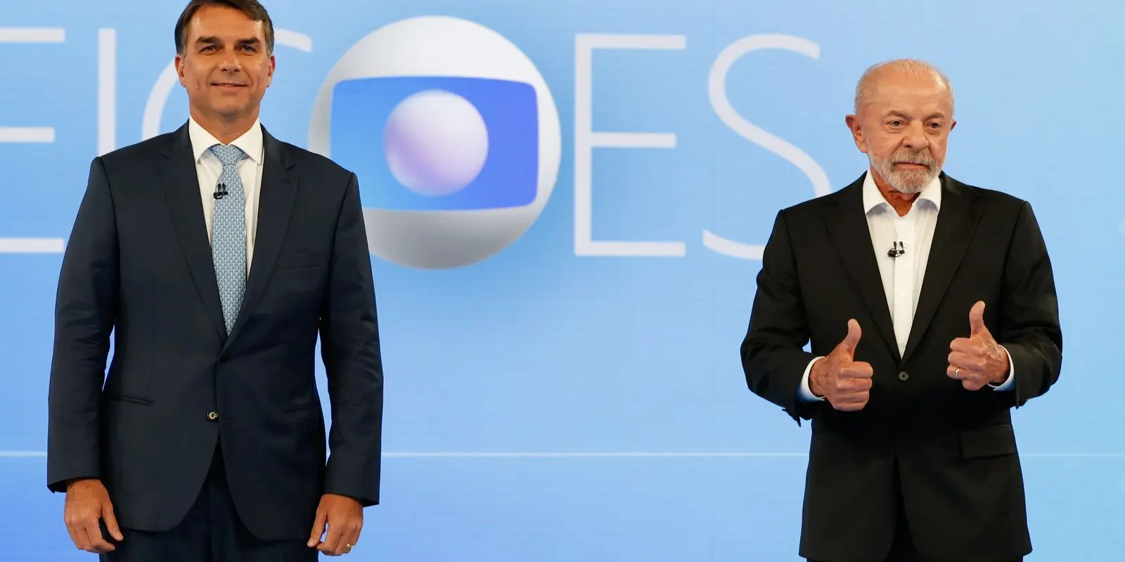 Última pesquisa Quaest saiu um dia depois do debate: Flávio Bolsonaro e Lula no estúdio da Globo