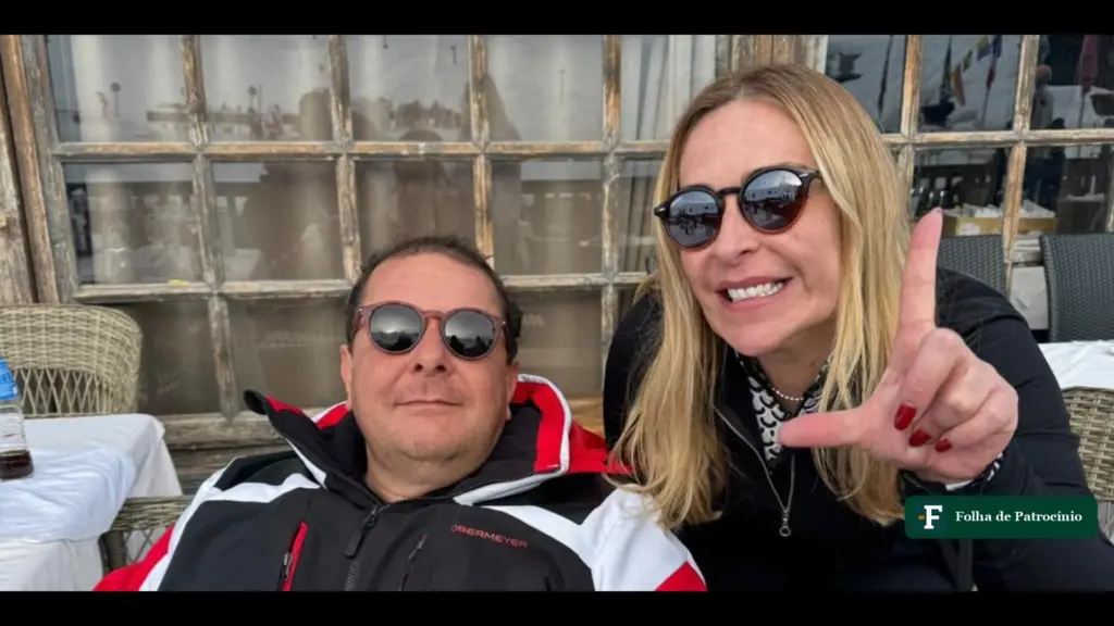 Viagens de Lulinha: Fábio Luís Lula da Silva e Roberta Luchsinger de óculos escuros em varanda de chalé nos Alpes