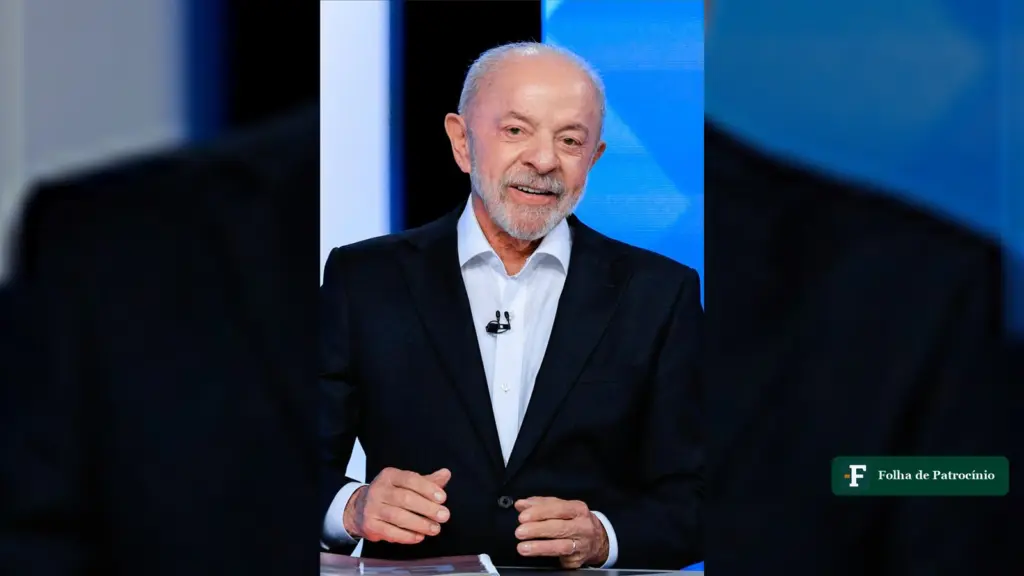Votação na Nova Zelândia: Lula sorri sentado no estúdio do debate da TV Globo